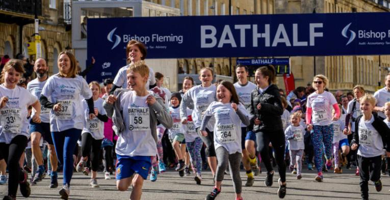 Families and youngsters running in Bath