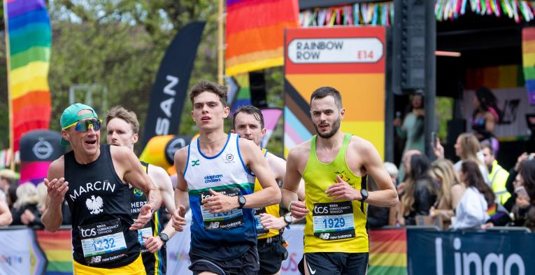 Runners pass through Rainbow Row