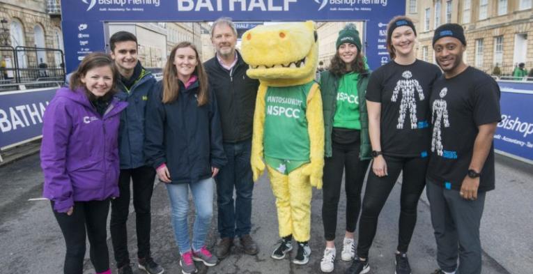 Charity representatives standing in the street in Bath