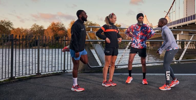 A group chatting during their training session
