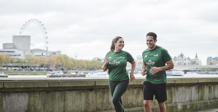 Kelly Brook and Jeremy Parisi running in Central London