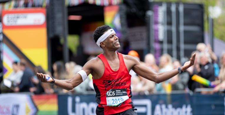TCS London Marathon participant looking to the crowd for some encouragement 