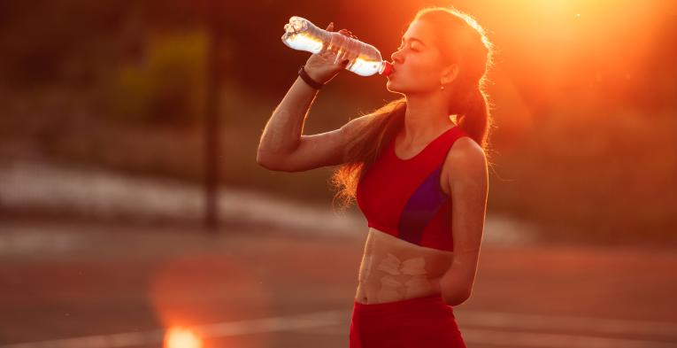 Portrait young woman athlete with an amputated arm 