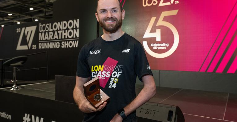 Ant Bryan with his Spirit of London Marathon award