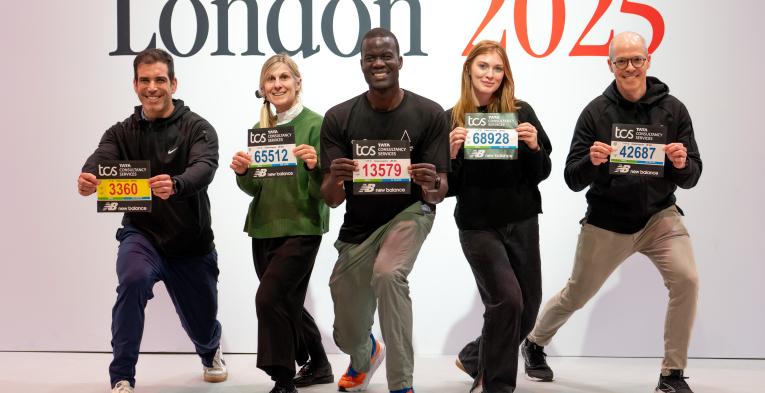 Participants pose with their bibs