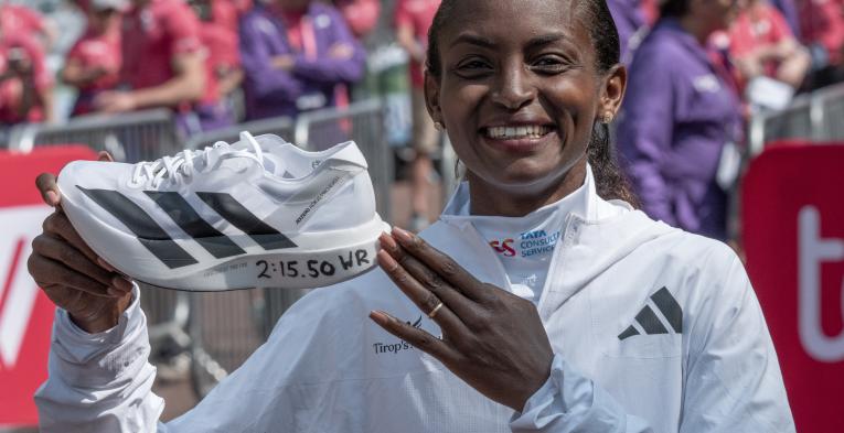 Tigst Assefa after winning the 2025 TCS London Marathon