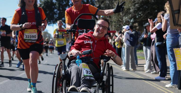 Assisted wheelchair group on the Brighton Marathon course