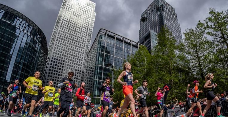 TCS London Marathon participants run through Canary Wharf