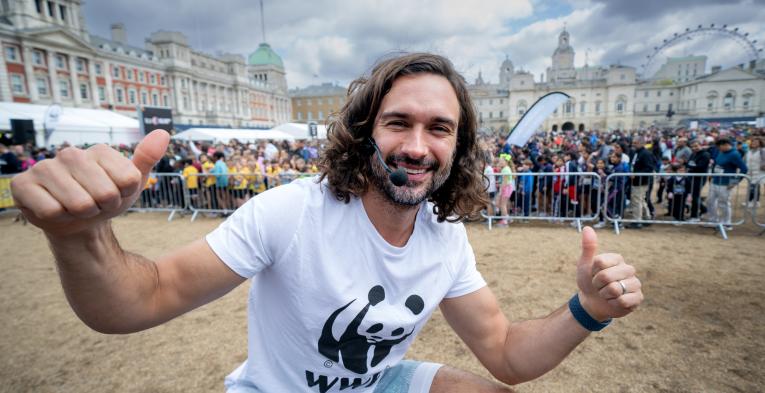 Joe Wicks leading the warm ups at the TCS Mini London Marathon