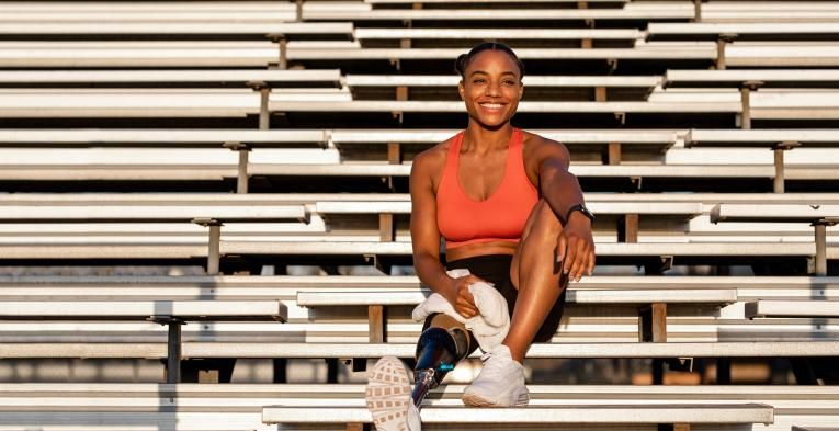 Runner relaxing in the sun after a training session 