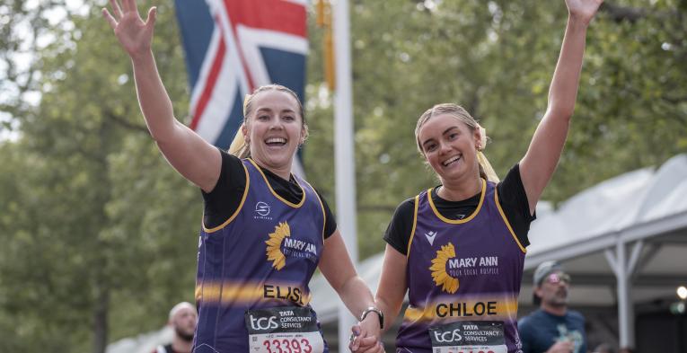 Charity runners about to cross the Finish Line