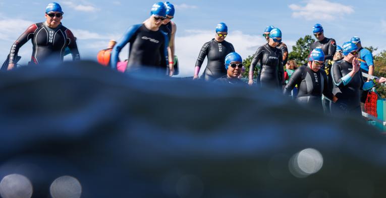 Swim Serpentine participants enter the water 