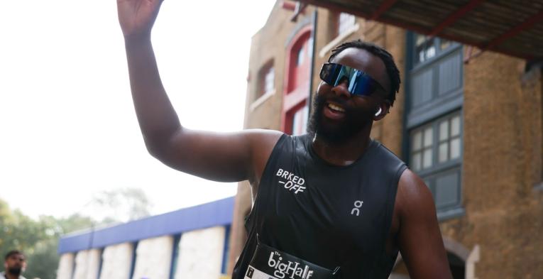 Runner poses for the camera at The Big Half