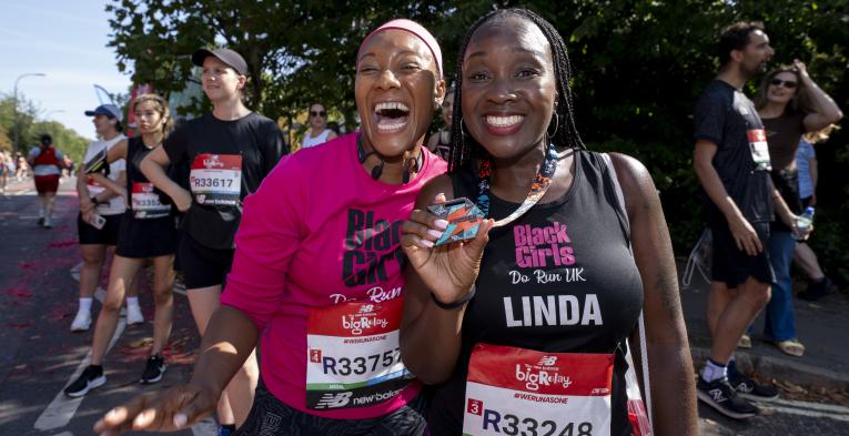 New Balance Big Half relay participants show off their medals