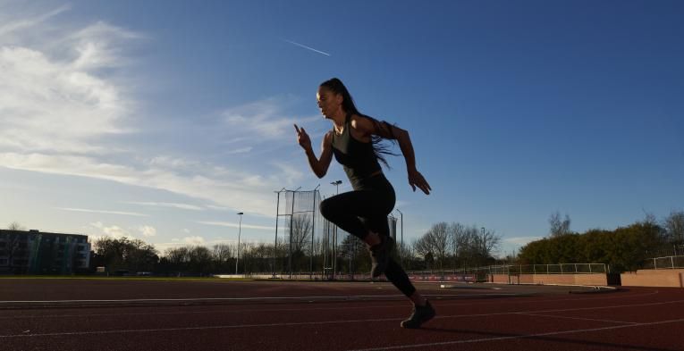 Runner getting ready to start on the track