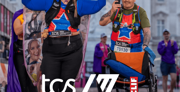 Runners celebrate finishing the TCS London Marathon