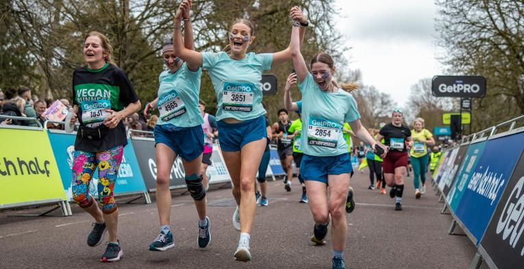 Runners celebrate at the 2027 GetPRO Bath Half