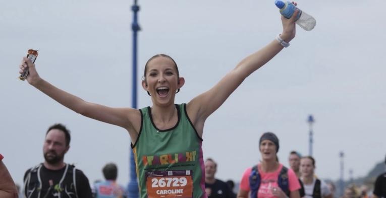 Caroline taking part in a running event 