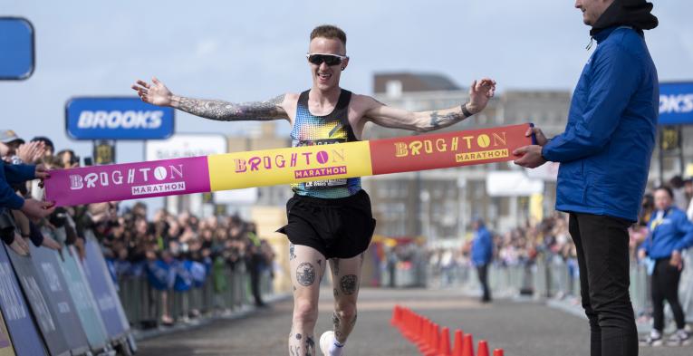 Sam Cook crossing the Finish Line