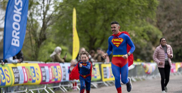 Two participants dressed as superman