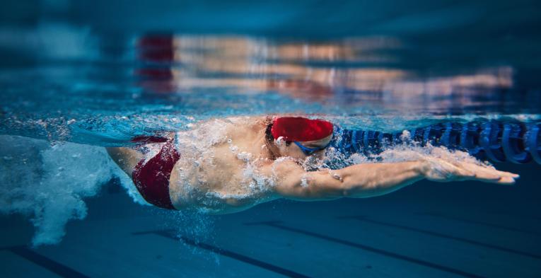 Man swimming under water