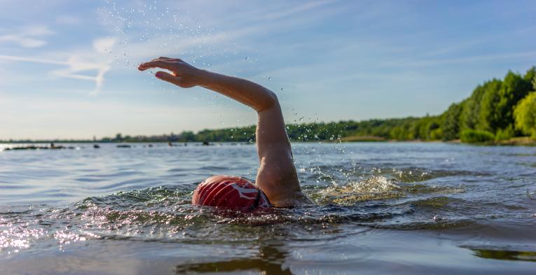 Someone swimming in the open water
