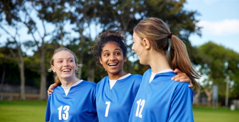 students on a football pitch