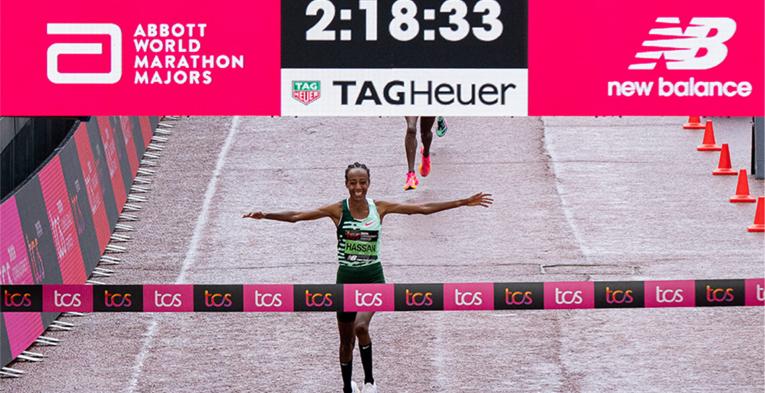 Sifan Hassan celebrates as she crosses the finish line