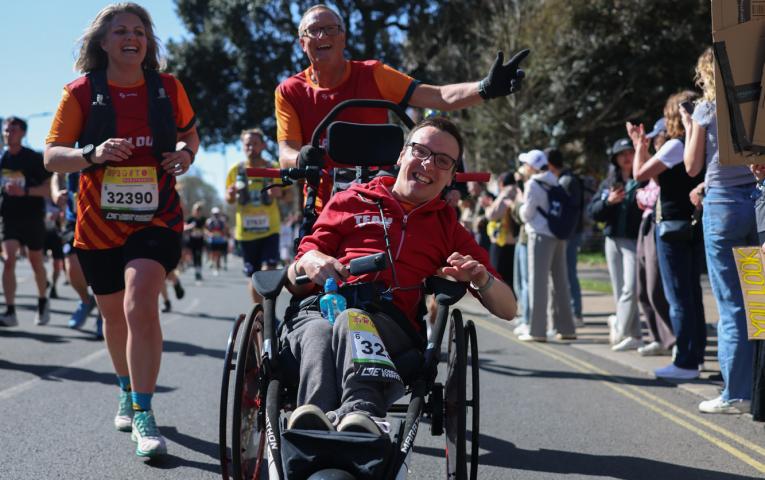 Assisted wheelchair group on the Brighton Marathon course