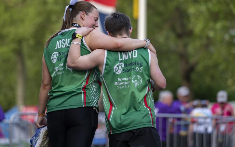 London Marathon runners supporting each other