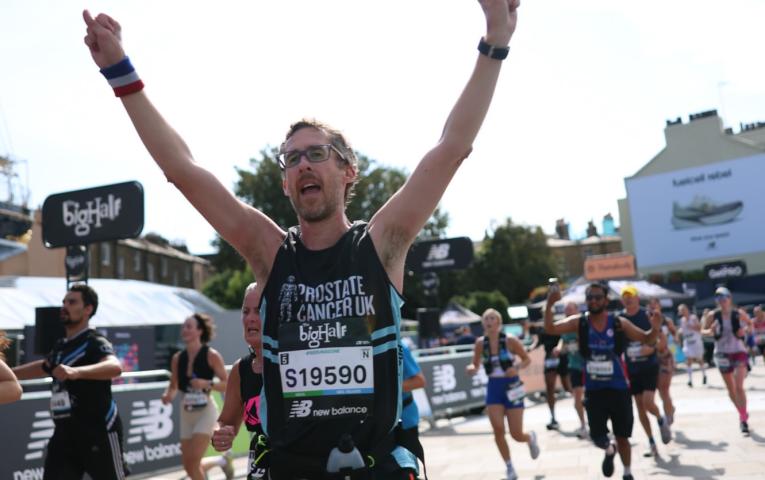 Runner who is wearing a Prostate Cancer UK vest