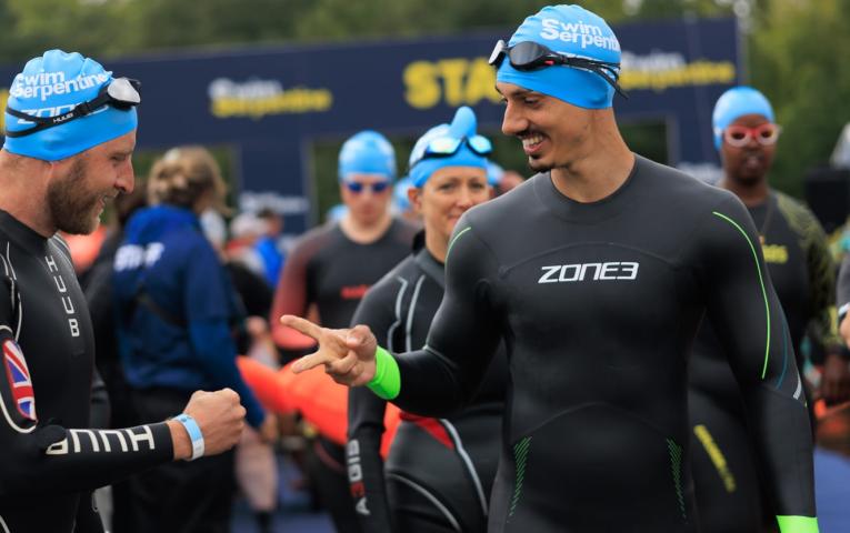 Swimmers play rock, paper, scissors at the Start 