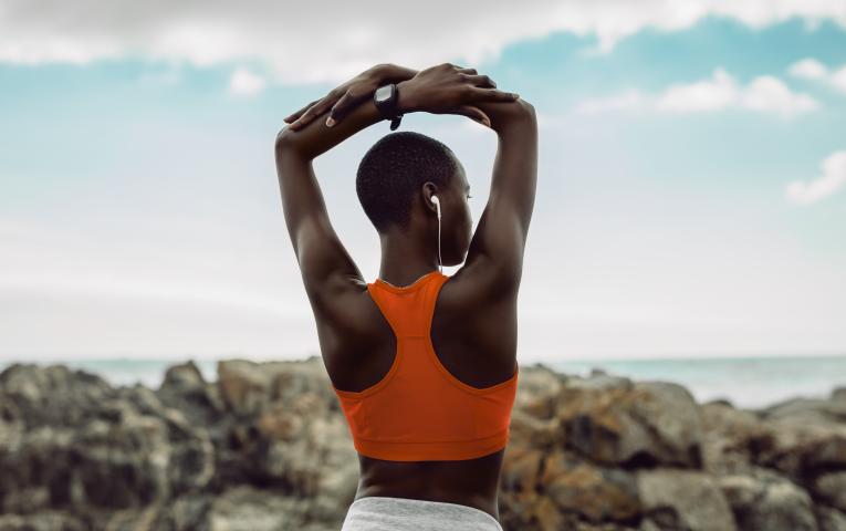Female stretching before starting a workout 