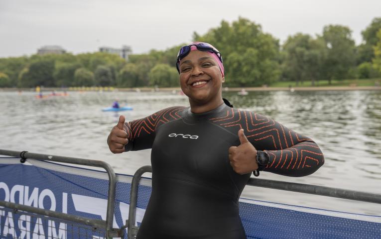 Swimmer smiling before heading into the water