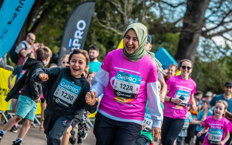 Bath Miles participants smiling on the course