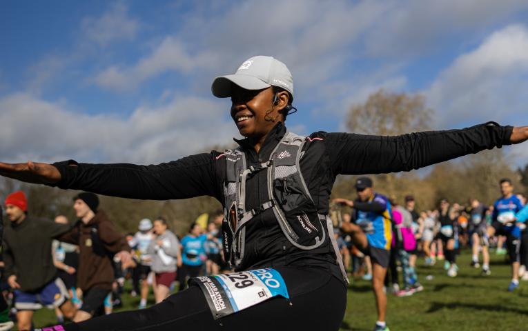 Runner warming up in the park 