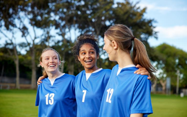 students on a football pitch