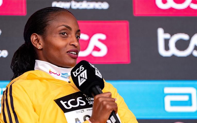 Tigst Assefa at the 2024 TCS London Marathon press conference