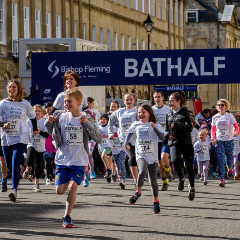 Families and youngsters running in Bath