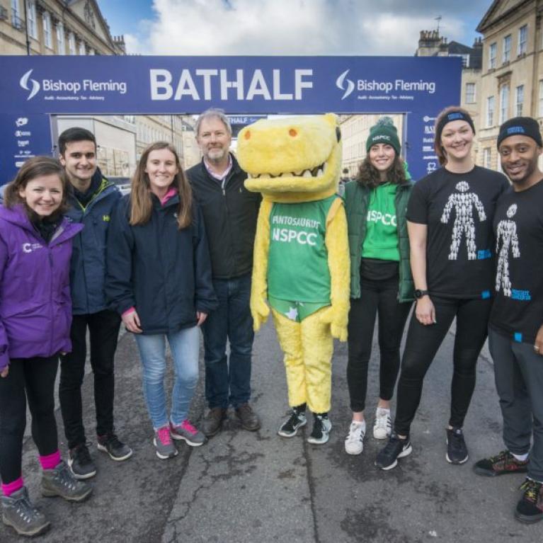 Charity representatives standing in the street in Bath