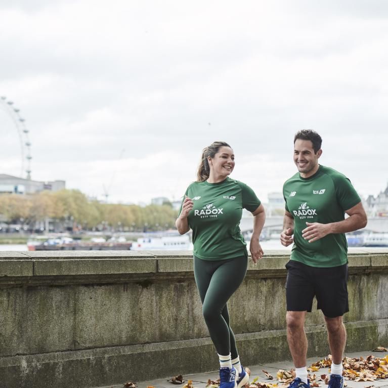 Kelly Brook and Jeremy Parisi running in Central London