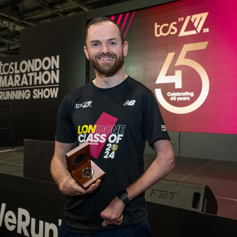 Ant Bryan with his Spirit of London Marathon award