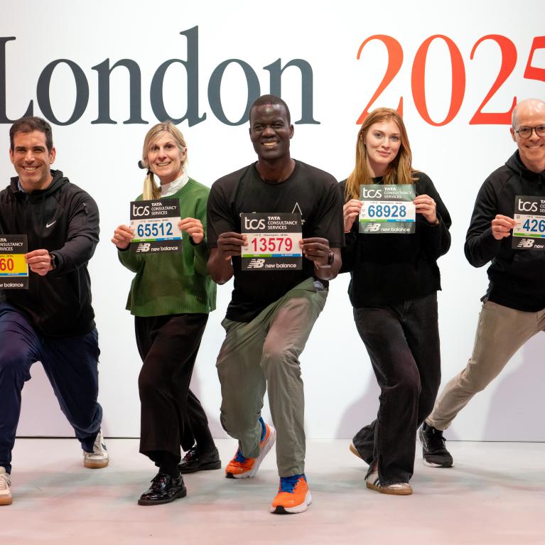 Participants pose with their bibs