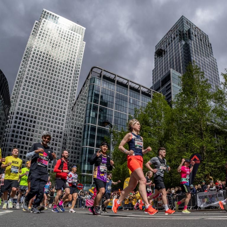 TCS London Marathon participants run through Canary Wharf