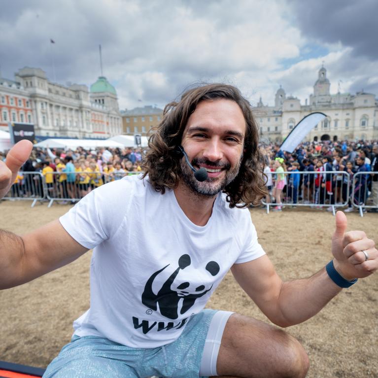 Joe Wicks leading the warm ups at the TCS Mini London Marathon
