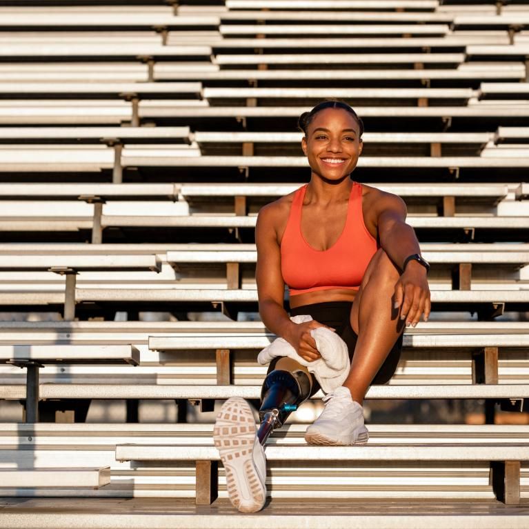Runner relaxing in the sun after a training session 