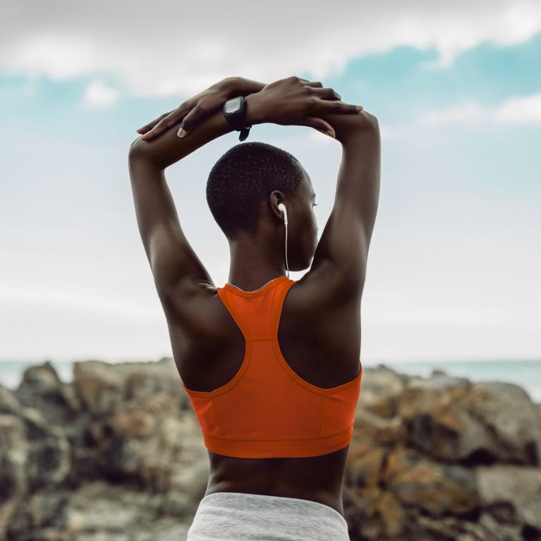 Female stretching before starting a workout 