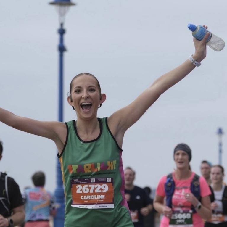 Caroline taking part in a running event 