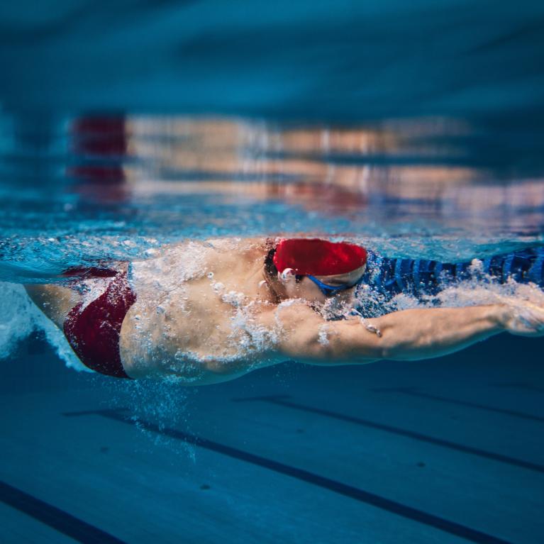 Man swimming under water
