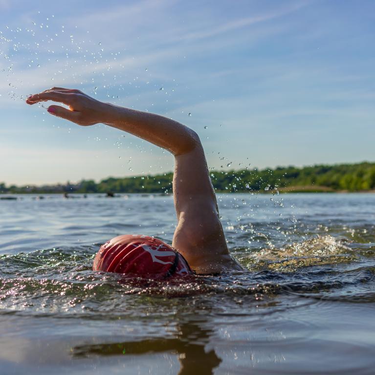 Someone swimming in the open water